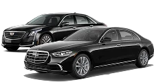 An icon of two business sedans